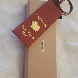 Miu miu leathet bookmark or luggage tag